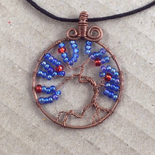 Load image into Gallery viewer, Tree-of-life pendant with copper wire and blue/red beads. Cherry Tree.