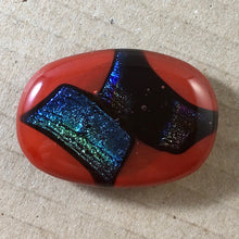 Load image into Gallery viewer, A red fused-glass magnet with sparkly dichroic features.
