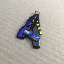 Load image into Gallery viewer, A blue and black fused-glass pendant with dichroic features.
