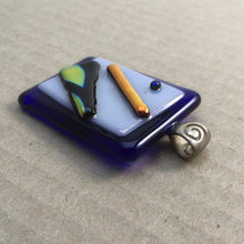 Load image into Gallery viewer, A blue and white fused-glass pendant with dichroic features and spiral bail.
