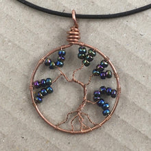 Load image into Gallery viewer, Blue tree of life pendant with copper wire.
